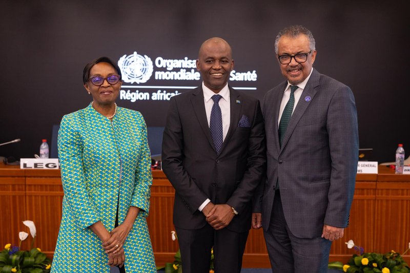 Dr. Faustine Engelbert Ndugulile stands with Dr Moeti, present Regional Director of WHO AFRO and Dr Tedros Adhanom Ghebreyesus, WHO Director-General