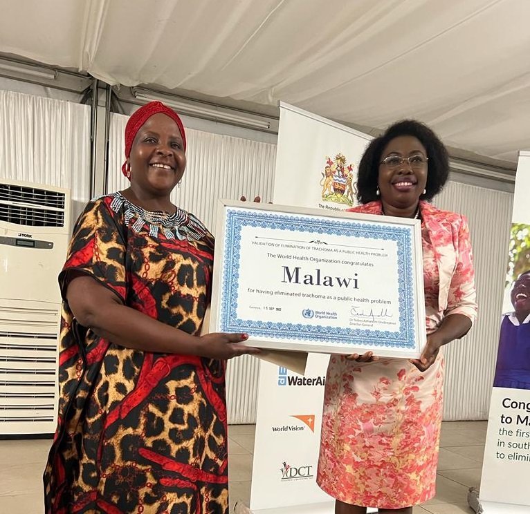 Honourable Khumbize Kandodo Chiponda MP, Minister of Health in Malawi, is congratulated as Malawi becames the first country in southern Africa to eliminate trachoma,