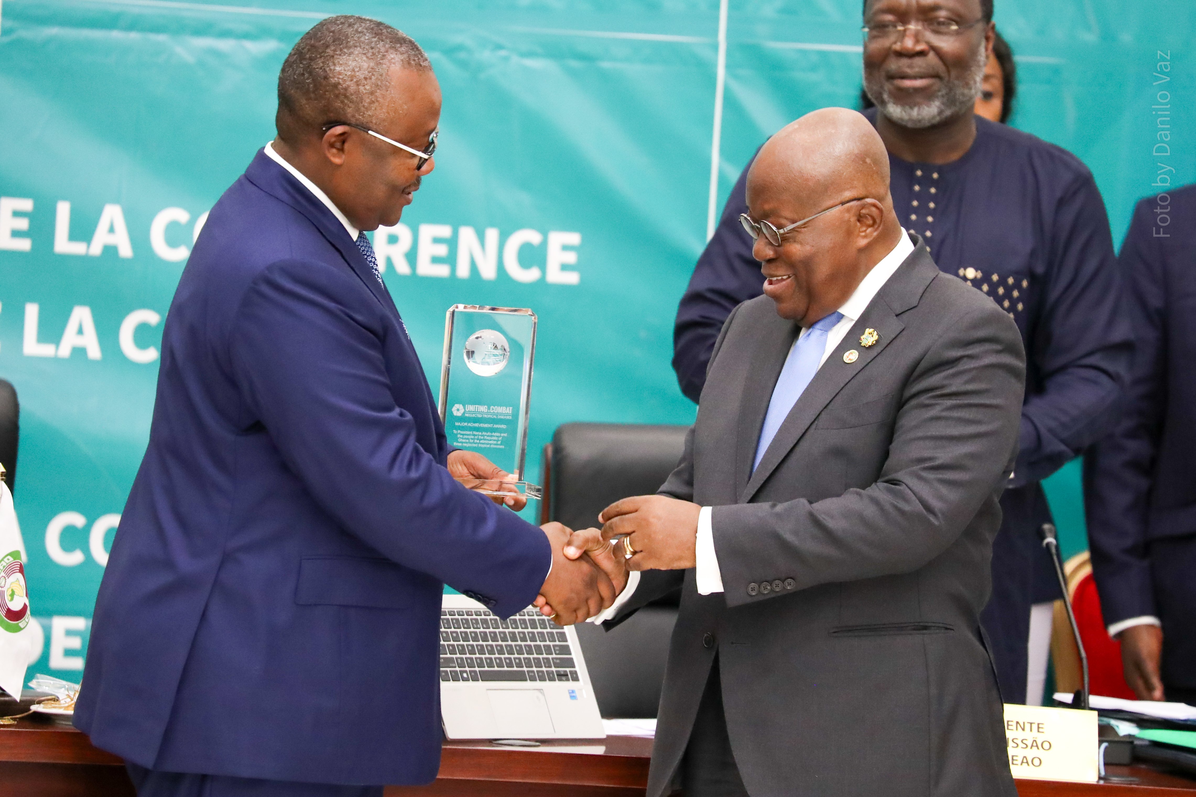 Umaro Sissoco Embaló, President of Guinea Bissau and Chair of the Authority of ECOWAS Heads of State and Government presents an award to Nana Akufo-Addo, President of the Republic of Ghana