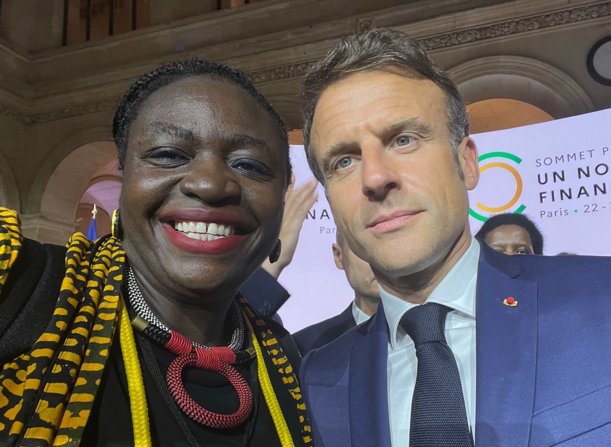 Thoko Elphick-Pooley with Emmanuel Macron, President of France, at the Paris Summit for a New Financing Pact