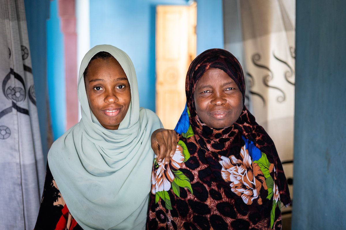 Mzowele Khamisi Juma, a 52-year-old LF patient (pictured right) and her daughter Zuleika Sheha Haji, who serves as her primary caregiver (left)